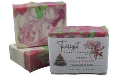 Handcrafted soap with a label from Twilight Soap Company on a dark surface.