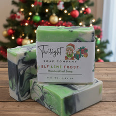 Green and white soap bar with a label from Twilight Soap Company on a gray surface.