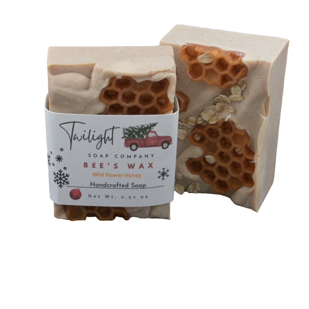 Beeswax soap with honeycomb design and a Twilight Soap Company label on a gray surface.