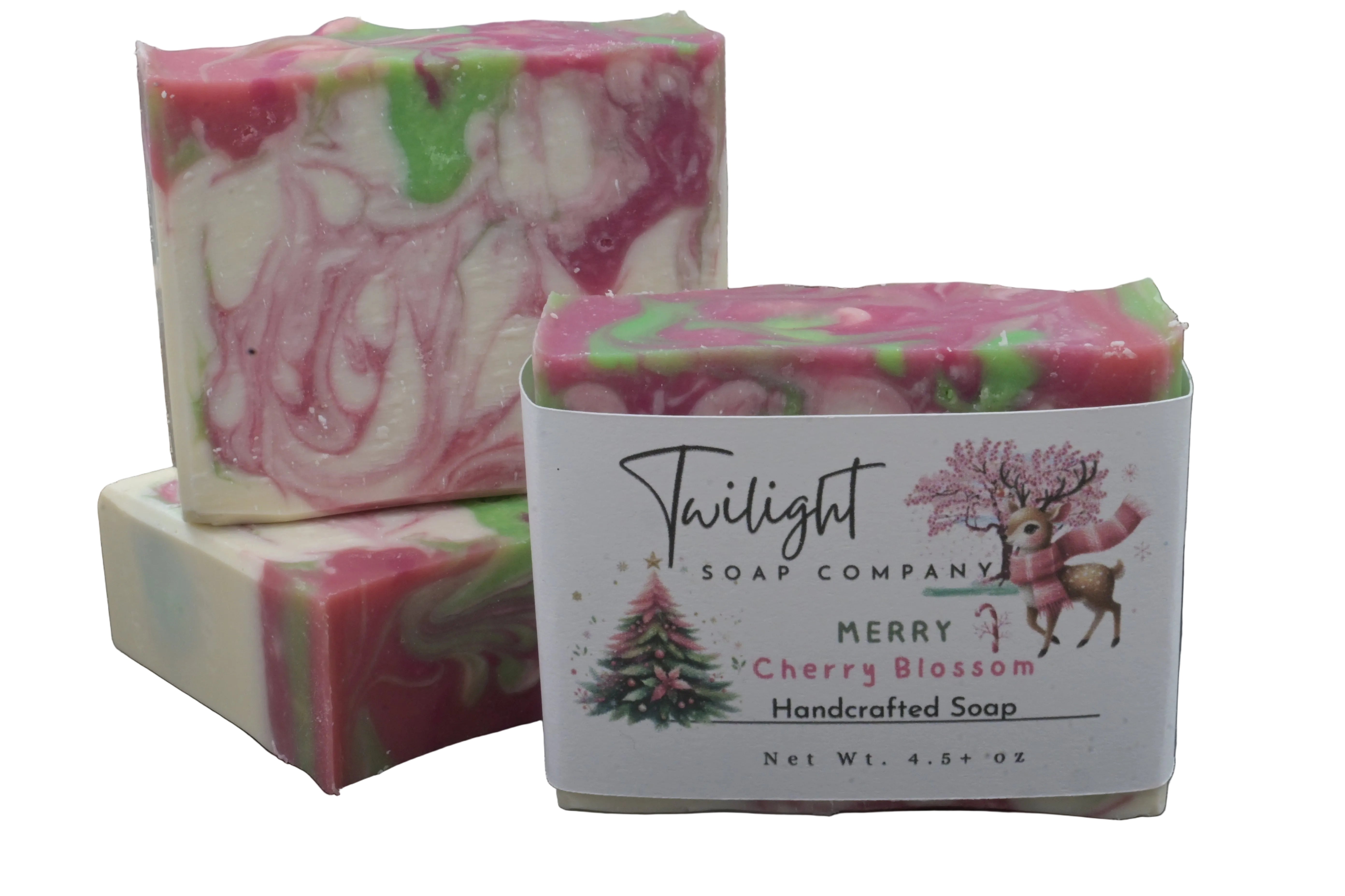Handcrafted soap with a label from Twilight Soap Company on a dark surface.