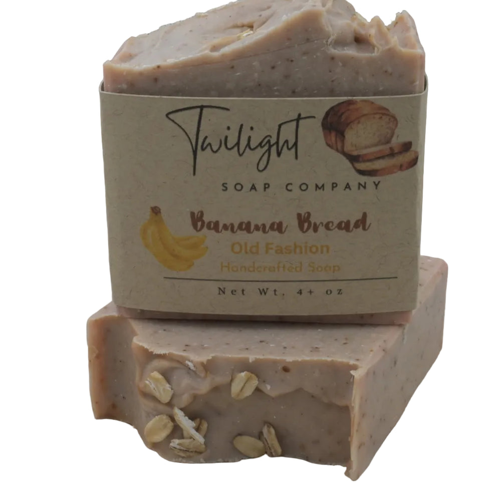 Bar of soap from Twilight Soap Company with banana bread flavor on a wooden background